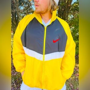 Vintage Men’s large NIKE yellow blue red windbreaker jacket mesh coat sporty